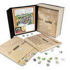 Inside the box: the three puzzles in kraft Evidence envelopes with Inspector Wasgij case notes and the solution pinned in the lid
