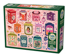 Box, turned left: Tea Tin Treasures – 1000 Piece Jigsaw Puzzle (Cobble Hill)