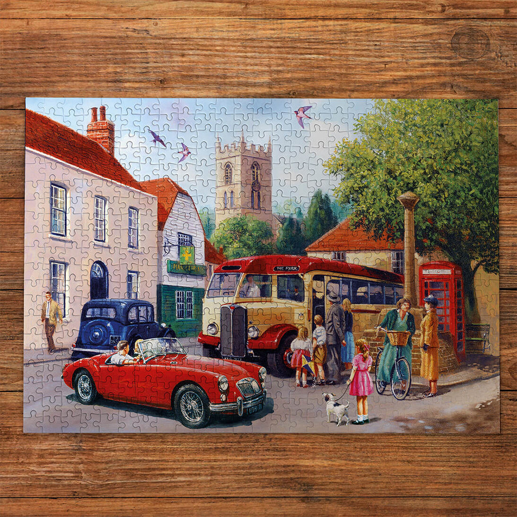 Puzzle in progress: Touring the Town by Kevin Walsh – 500 Piece Jigsaw Puzzle (Gibsons)