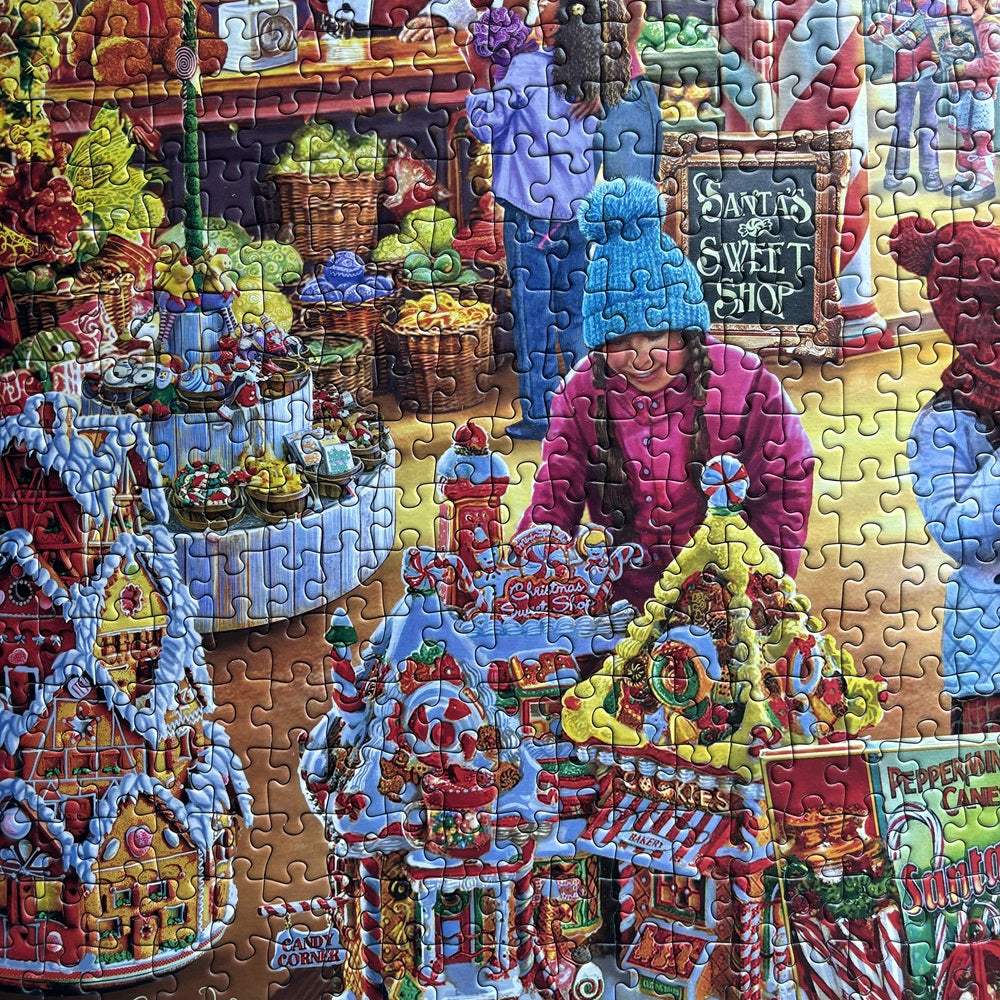 Puzzle in progress: Santa's Sweetshop – 1000 Piece Jigsaw Puzzle (Gibsons)