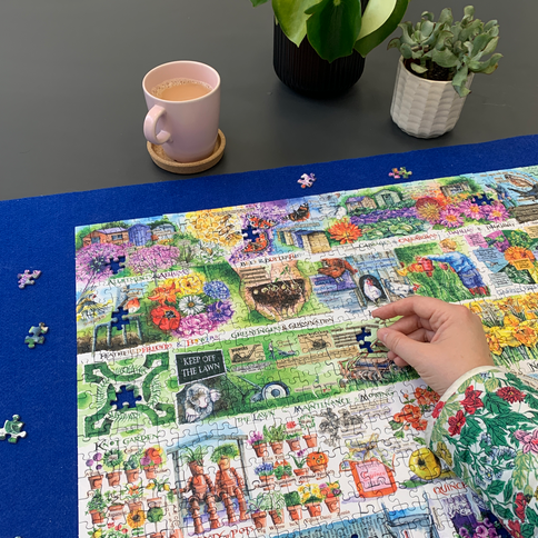 In use: Jigsaw Puzzle Board – 1000 Piece Jigsaw Puzzle (Gibsons)